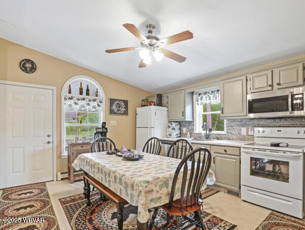 1498 Gainer Hill Rd, Dushore, PA 18614 - dining room featuring vaulted ceiling and ceiling fan