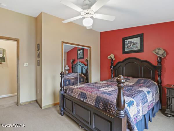 1498 Gainer Hill Rd, Dushore, PA 18614 - bedroom featuring light carpet and ceiling fan