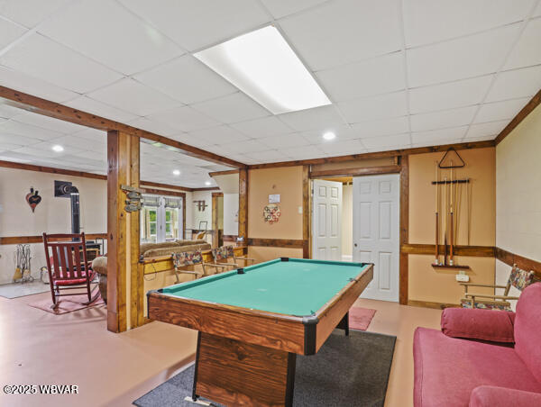 1498 Gainer Hill Rd, Dushore, PA 18614 - game room featuring pool table, a paneled ceiling, finished concrete flooring, recessed lighting, and ornamental molding