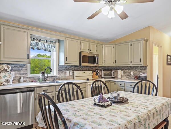 1498 Gainer Hill Rd, Dushore, PA 18614 - kitchen with stainless steel appliances, light countertops, cream cabinets, a ceiling fan, and lofted ceiling
