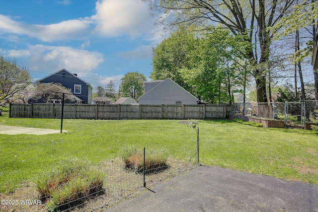 view of yard with a fenced backyard