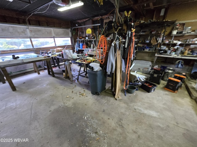 garage with a workshop area