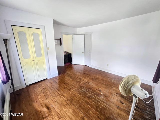 unfurnished bedroom featuring wood-type flooring