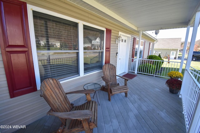 wooden terrace with covered porch