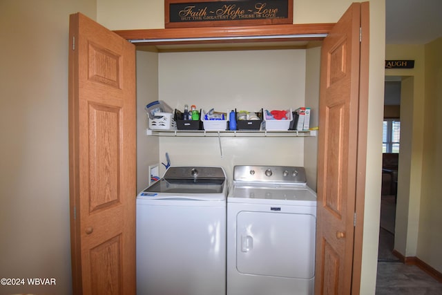 laundry area with separate washer and dryer