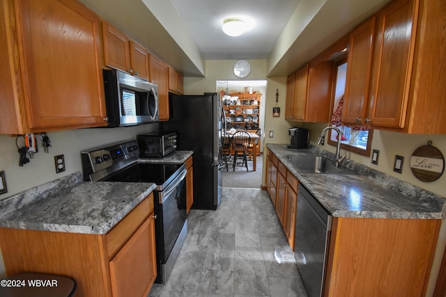 kitchen featuring sink and appliances with stainless steel finishes