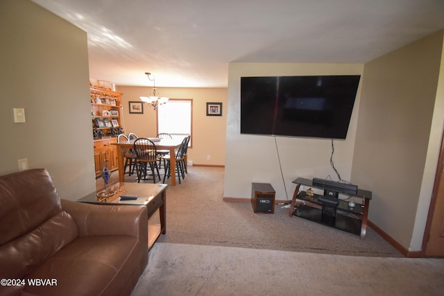 carpeted living room with an inviting chandelier