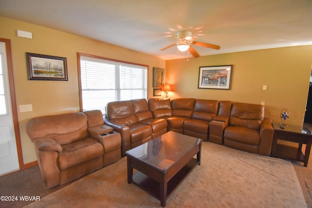 living room with ceiling fan and light carpet