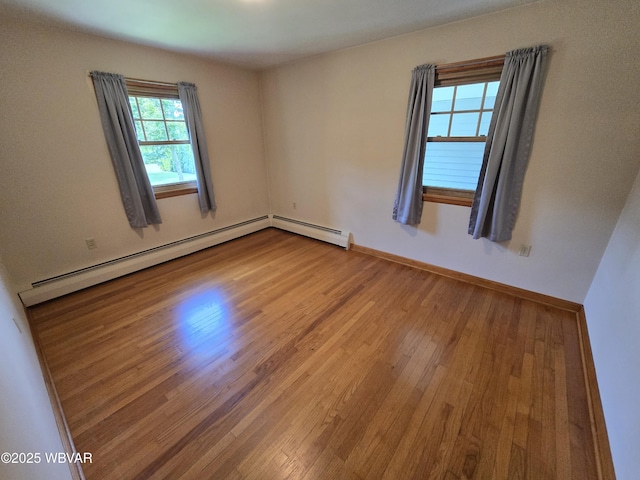 4401 Pine Mountain Rd, Jersey Shore, PA 17740 - spare room featuring wood finished floors and baseboard heating