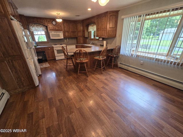 4401 Pine Mountain Rd, Jersey Shore, PA 17740 - dining room with dark wood-type flooring, a baseboard heating unit, and recessed lighting