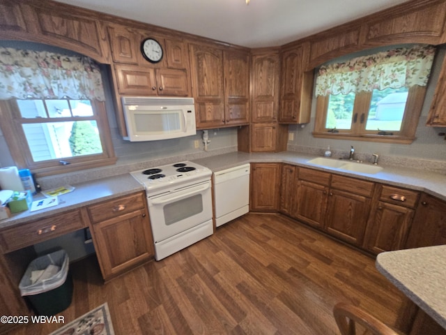 4401 Pine Mountain Rd, Jersey Shore, PA 17740 - kitchen featuring white appliances, healthy amount of natural light, light countertops, and dark wood finished floors