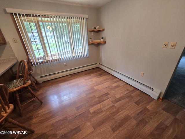 4401 Pine Mountain Rd, Jersey Shore, PA 17740 - unfurnished dining area featuring baseboard heating and wood finished floors
