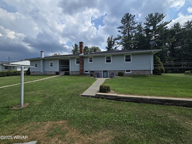 4401 Pine Mountain Rd, Jersey Shore, PA 17740 - rear view of property with a yard and a chimney