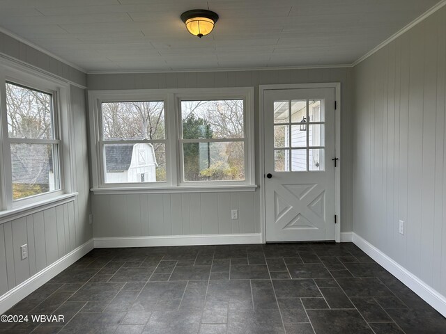 unfurnished sunroom with a wealth of natural light