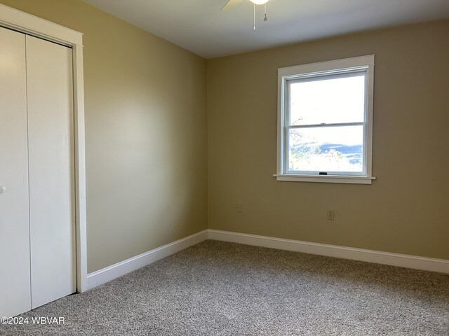 unfurnished bedroom with carpet flooring