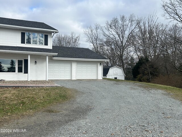 view of front of home with an outdoor structure