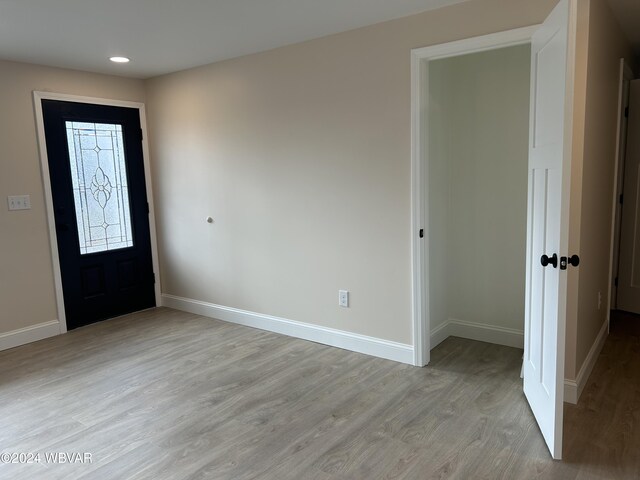 entryway with light wood-type flooring