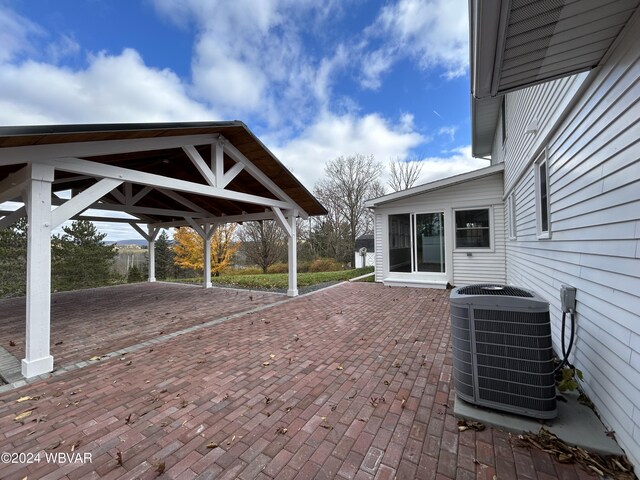 view of patio featuring central air condition unit