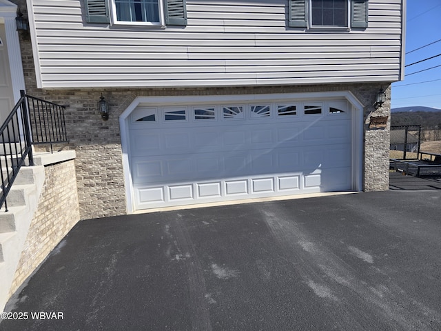 garage with driveway