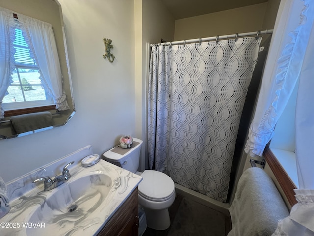 bathroom with a shower with shower curtain, toilet, and vanity