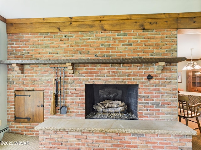 detailed view of a fireplace and baseboard heating