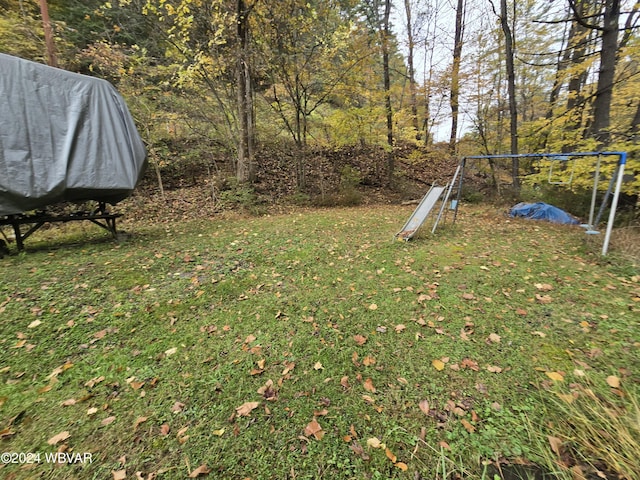 view of yard featuring a trampoline