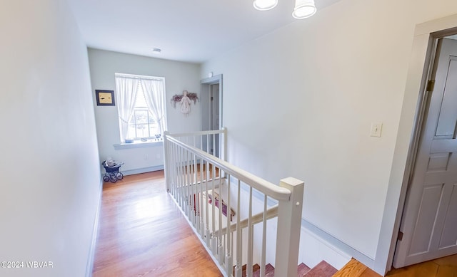 hall with light wood-type flooring