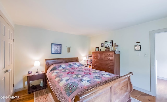 bedroom featuring light wood-type flooring