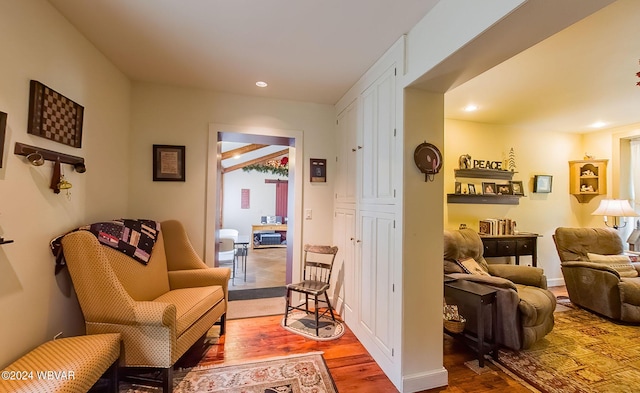 sitting room featuring wood-type flooring