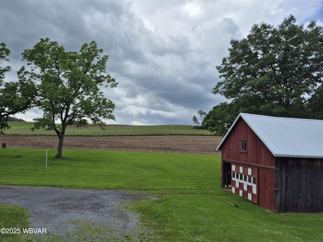 3510 Rt 184, Trout Run, PA 17771 - view of green lawn featuring an outbuilding, a garage, and driveway