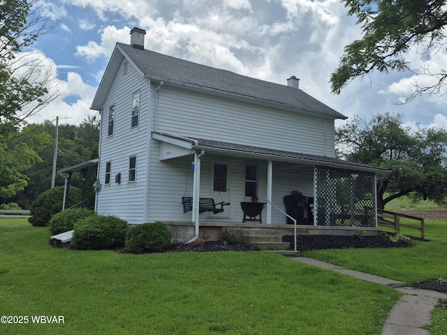 3510 Rt 184, Trout Run, PA 17771 - farmhouse inspired home with a porch, a front yard, a chimney, and roof with shingles