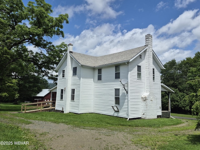 3510 Rt 184, Trout Run, PA 17771 - view of side of home with a chimney, a yard, and roof with shingles