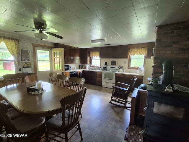 3510 Rt 184, Trout Run, PA 17771 - dining room featuring a wood stove and ceiling fan