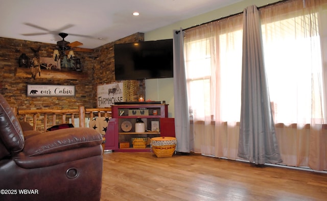 201 Richey St, Lock Haven, PA 17745 - living room with healthy amount of natural light, a ceiling fan, wood finished floors, and vaulted ceiling