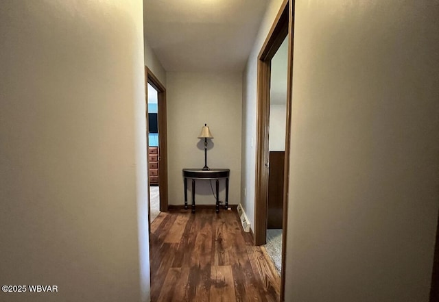 150 Pine Creek Ave, Jersey Shore, PA 17740 - corridor featuring dark wood-style floors and baseboards