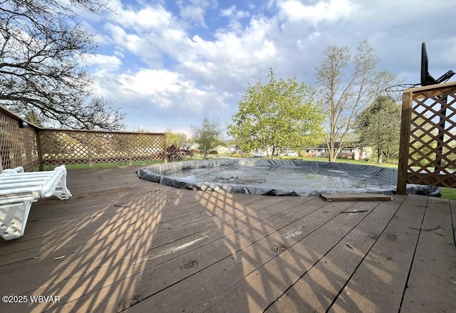 150 Pine Creek Ave, Jersey Shore, PA 17740 - wooden deck featuring a covered pool