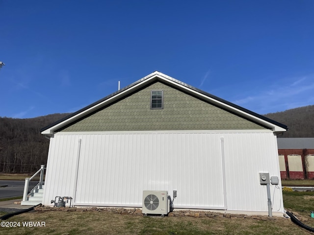 view of home's exterior featuring ac unit