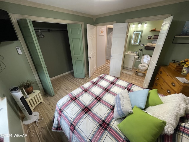 bedroom with connected bathroom, crown molding, a closet, and light wood-type flooring