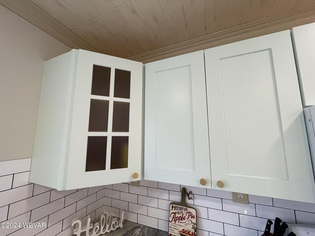 interior details featuring white cabinets