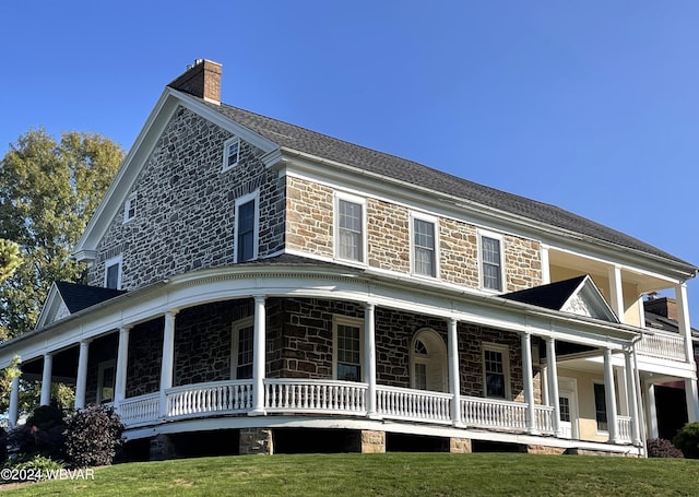 159 Harveys Ln, Milton, PA 17847 - view of side of property with a chimney, covered porch, and stone siding