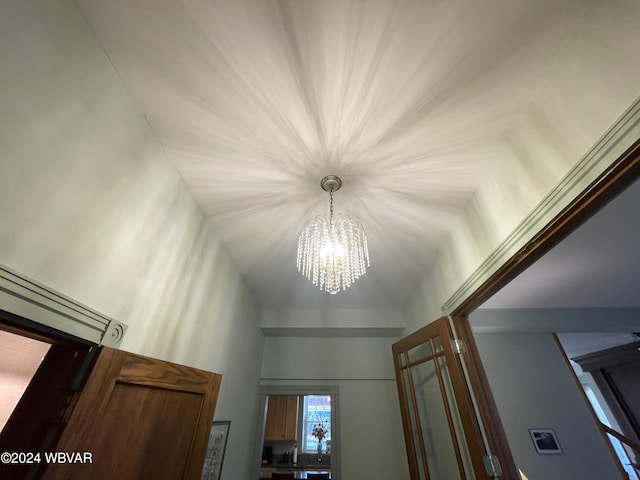 interior details with a chandelier