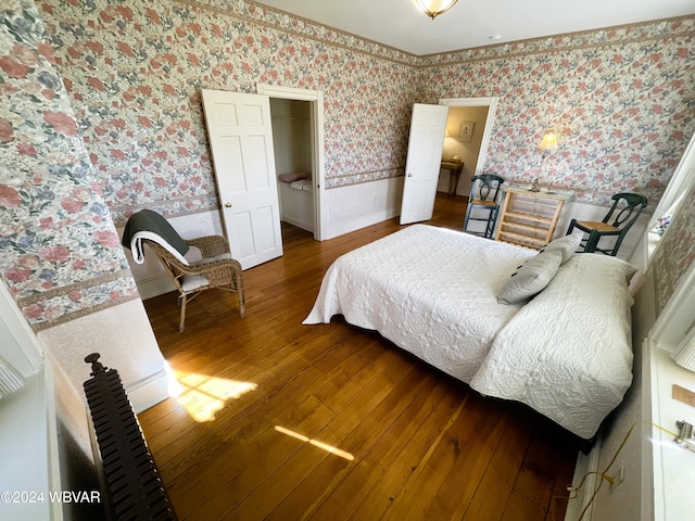 159 Harveys Ln, Milton, PA 17847 - bedroom with wallpapered walls and hardwood / wood-style flooring