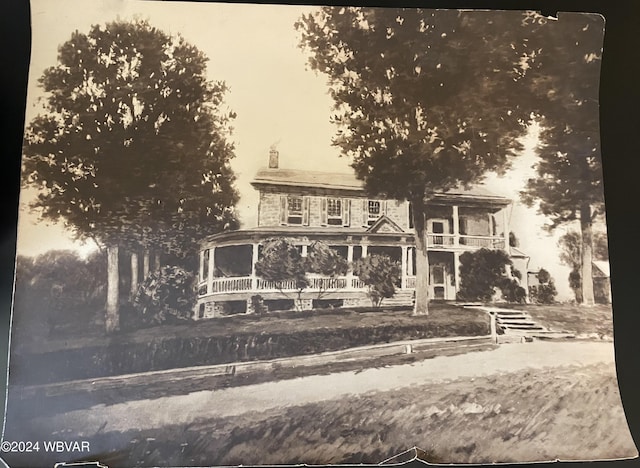 view of front of home featuring covered porch