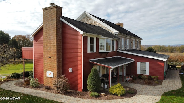 159 Harveys Ln, Milton, PA 17847 - view of side of property with a chimney and a patio