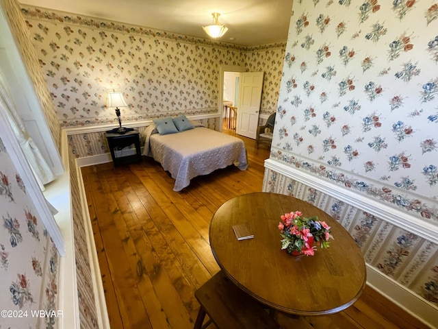 bedroom with wood-type flooring