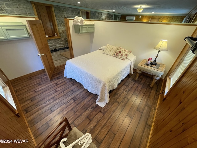 bedroom featuring dark wood-type flooring