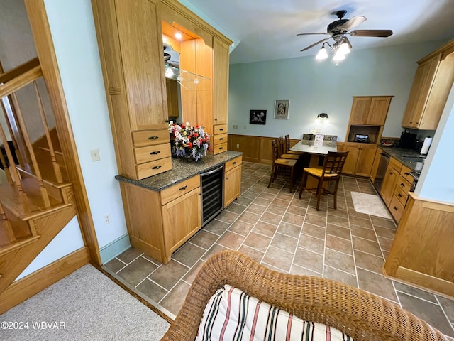 159 Harveys Ln, Milton, PA 17847 - kitchen with beverage cooler, a ceiling fan, wainscoting, and stainless steel dishwasher