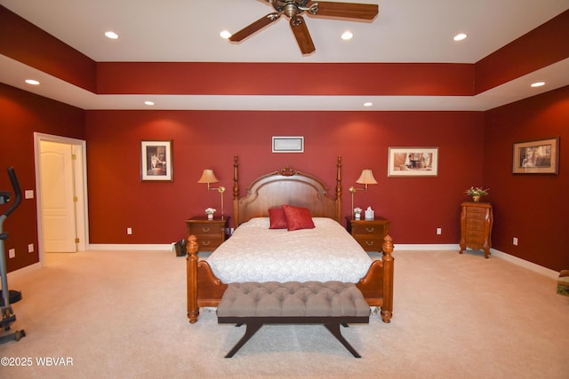 bedroom featuring light carpet, baseboards, and recessed lighting
