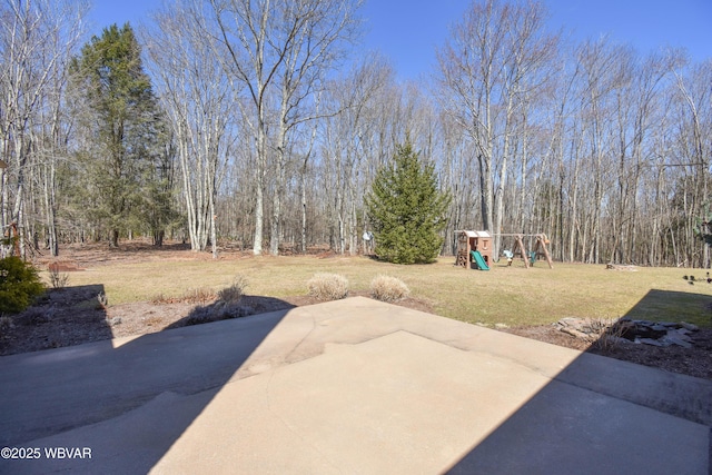view of patio featuring a playground