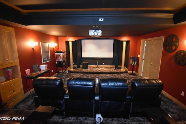 home theater featuring baseboards and ornate columns